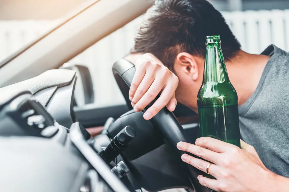 A very drunk man behind the wheel of a car after a crash who will need to hire a DUI defense lawyer in Cumberland County, PA.