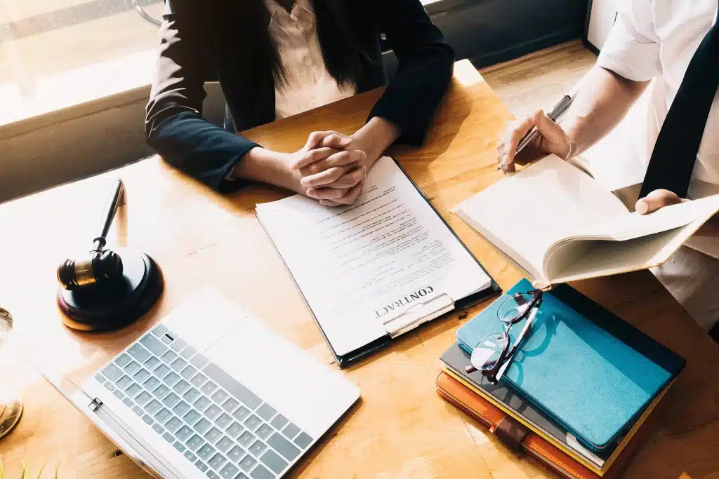 A woman discussing a business dispute.