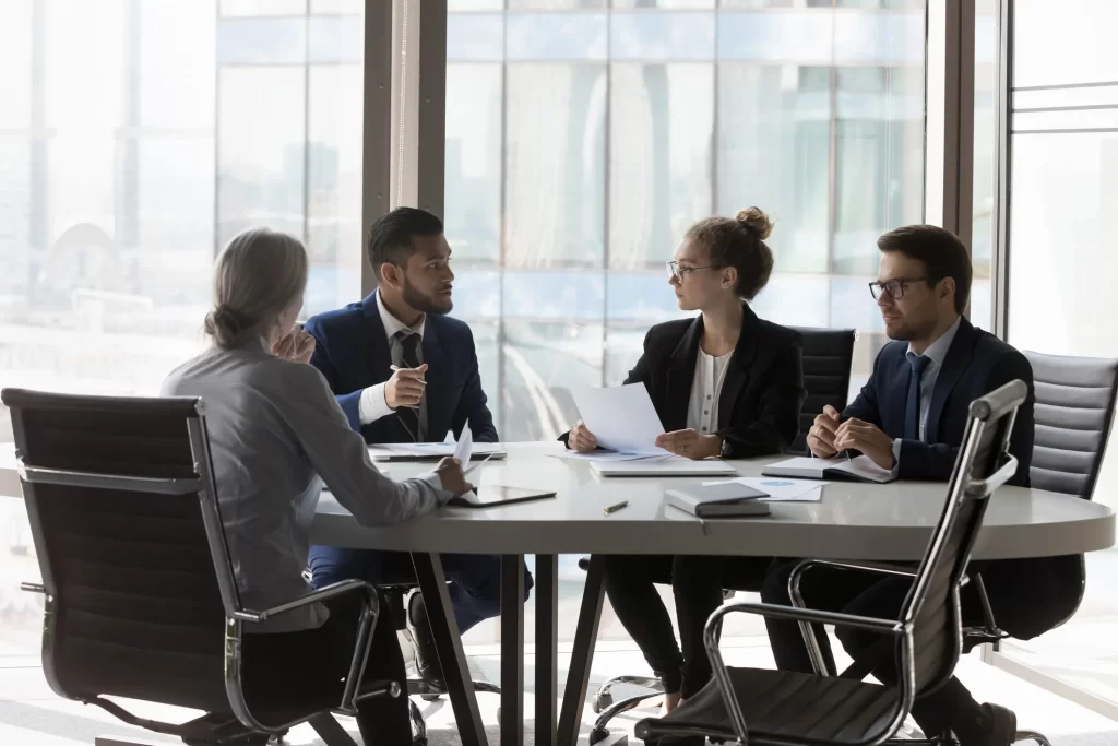 A group of staff in a business meeting.
