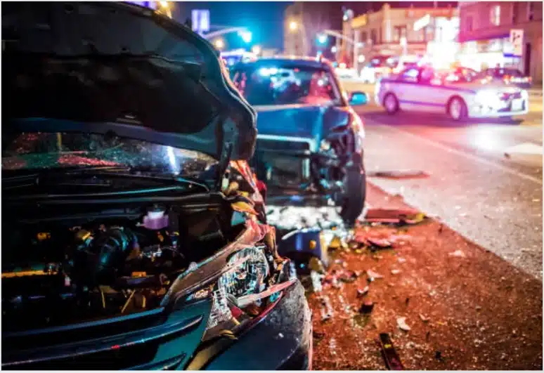 A car accident scene, one car crashed behind another car.