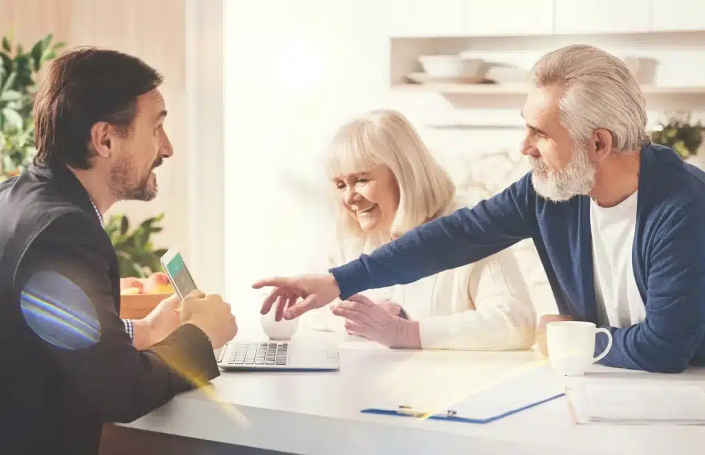 An older couple meeting with an estate lawyer.