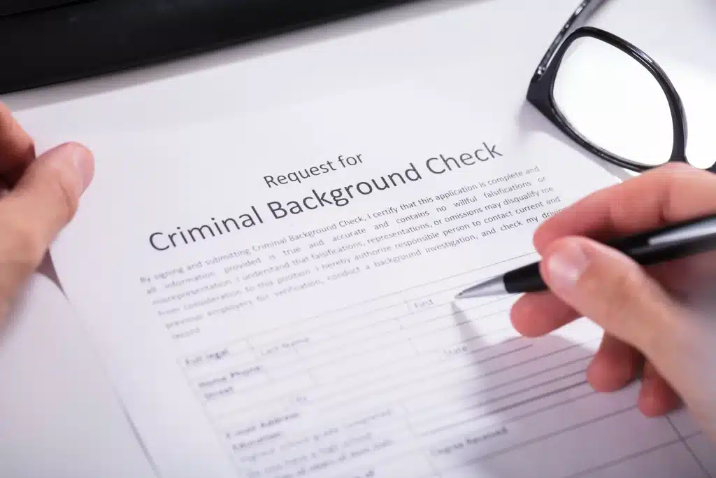 Filling out an employment background check.