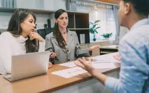 People at a business discussing an issue.